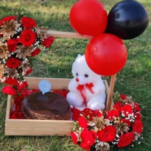 cake flowers , teddy bear in a wooden basket .send gifts to pakistan